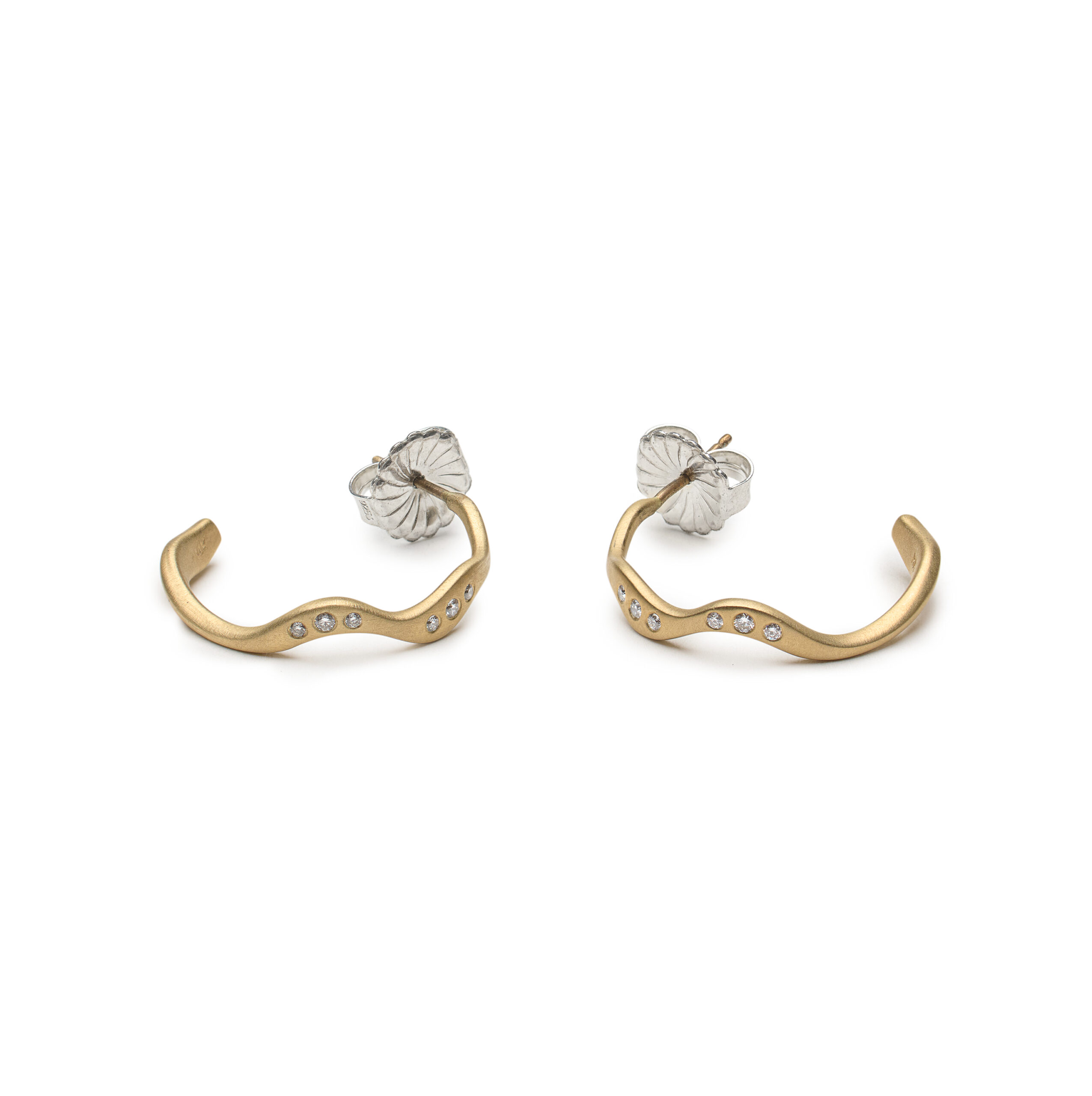 24 mm 14K gold hoop earrings with six flush-set diamonds, inspired by rippling water.