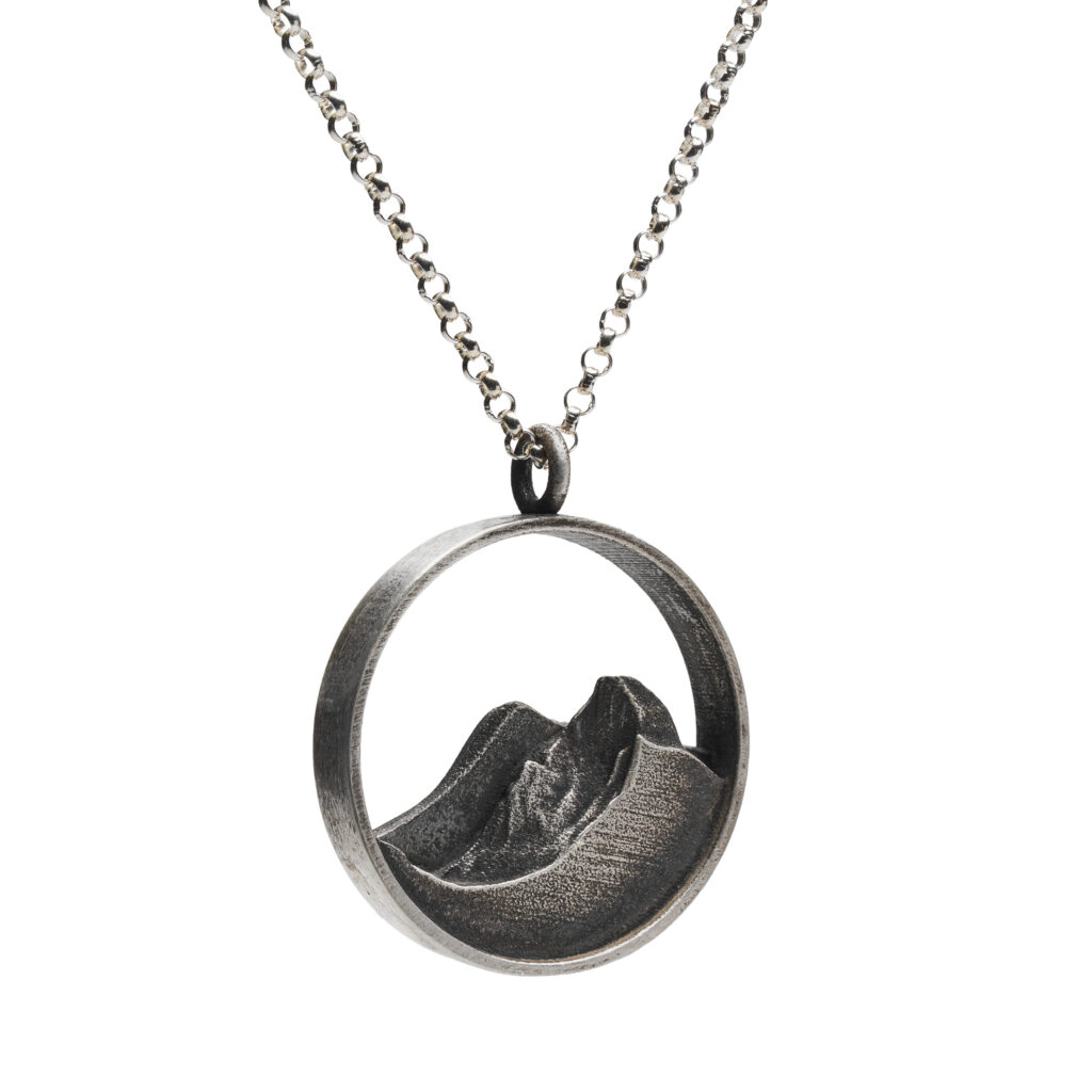 Oxidized sterling silver pendant depicting Half Dome on an 18-inch sterling silver chain.