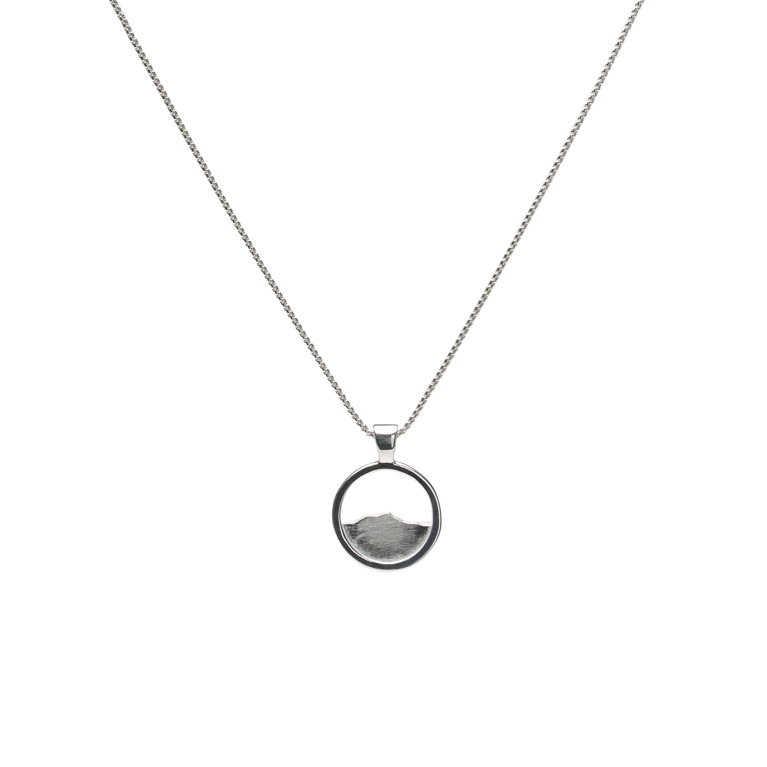 Camel’s Hump mountain silhouette pendant in gold or silver on an 18-inch chain.