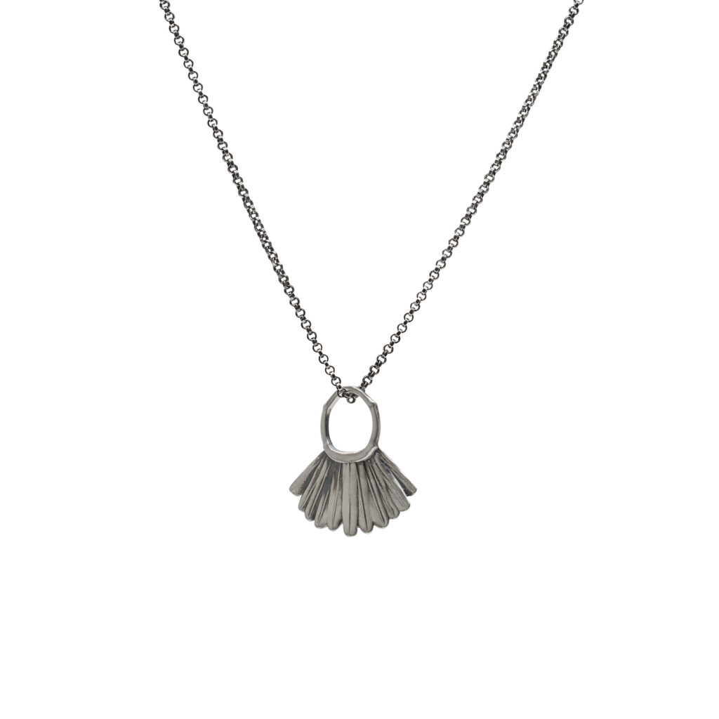 Sterling silver Zephyr Pendant of a Red-tailed Hawk with oxidized accents on an 18-inch chain.