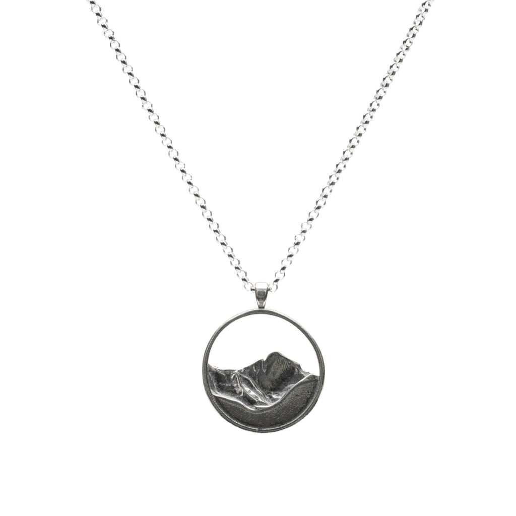 Oxidized sterling silver Longs Peak pendant on an 18-inch rolo chain.