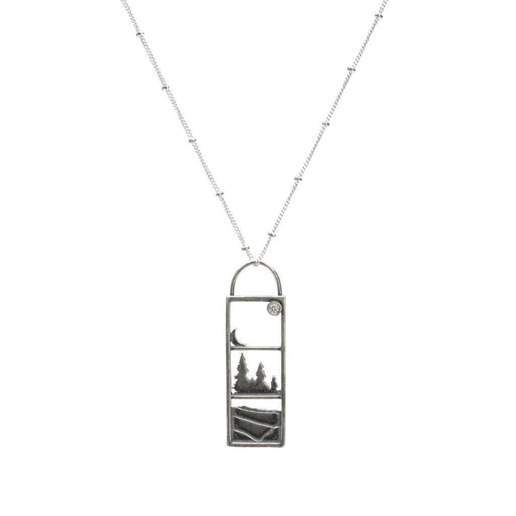Oxidized sterling silver Twilight View Pendant with crescent moon and diamond on an 18-inch chain.