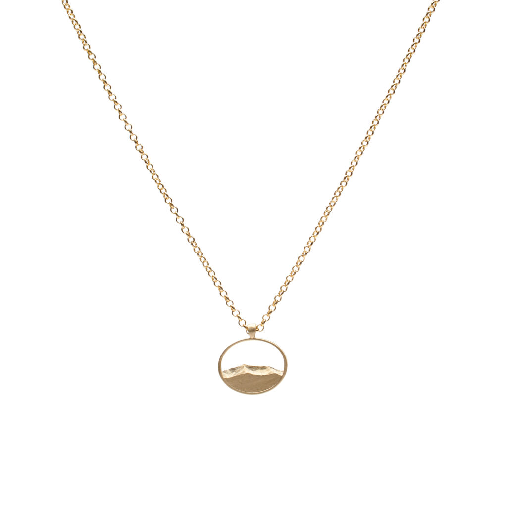 Mansfield Petite pendant showing Mount Mansfield’s ridgeline in sterling silver or 14K gold on an 18-inch chain.