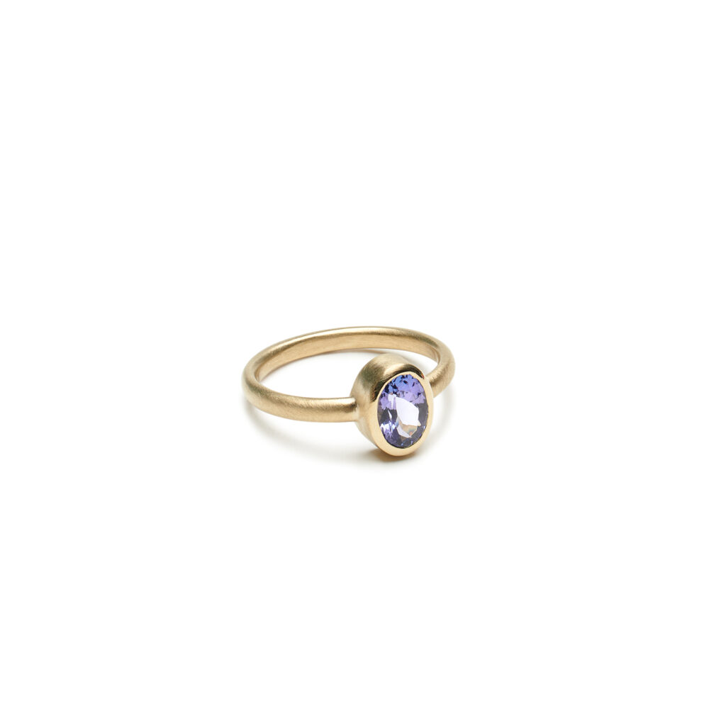 The Alpenglow Ring features a sculptural north–south silhouette and a luminous tanzanite. Custom stone options available. Made to order just for you.