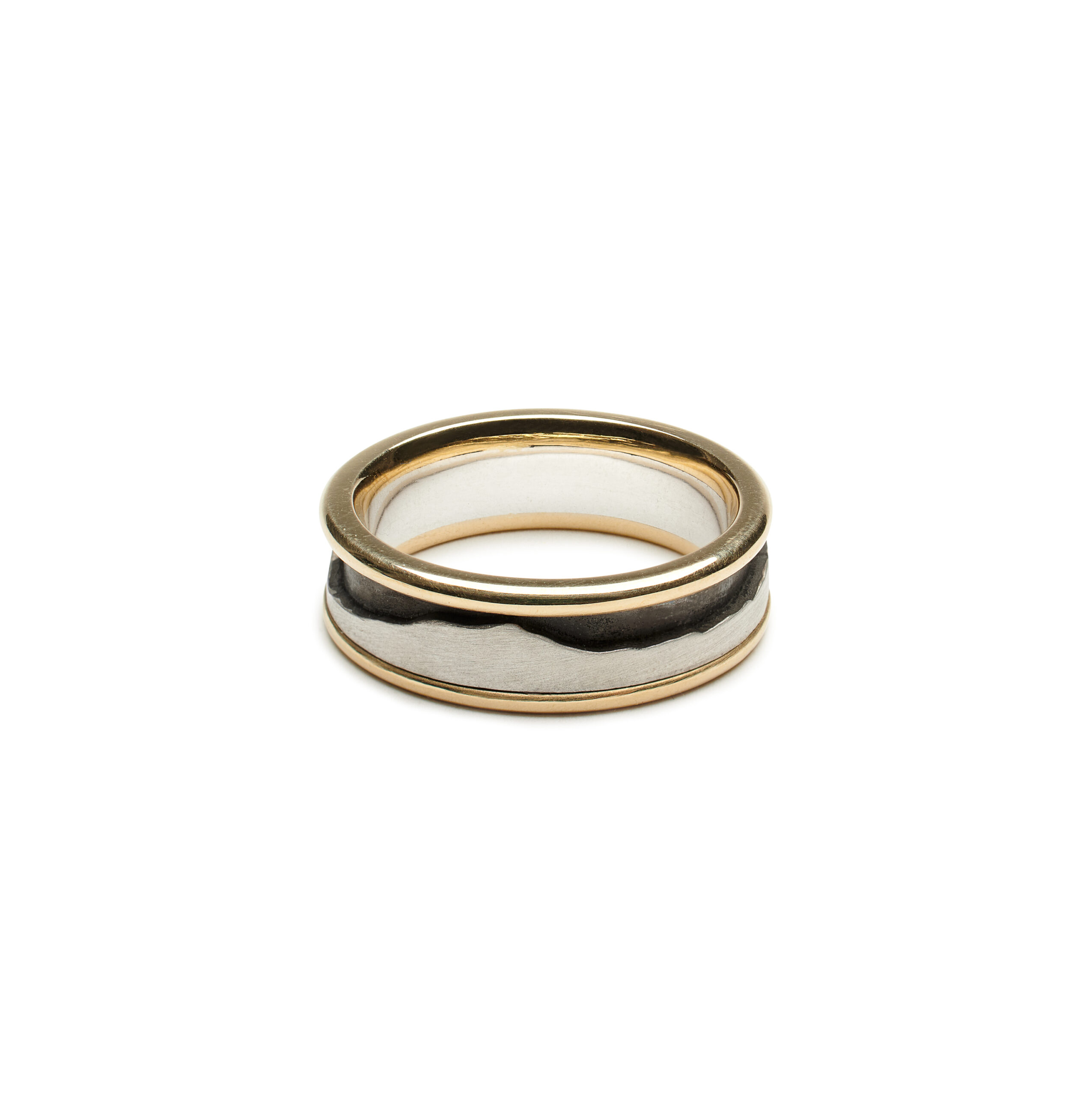 Camels hump depicted on the green mountain horizon ring with dual silver and gold metals