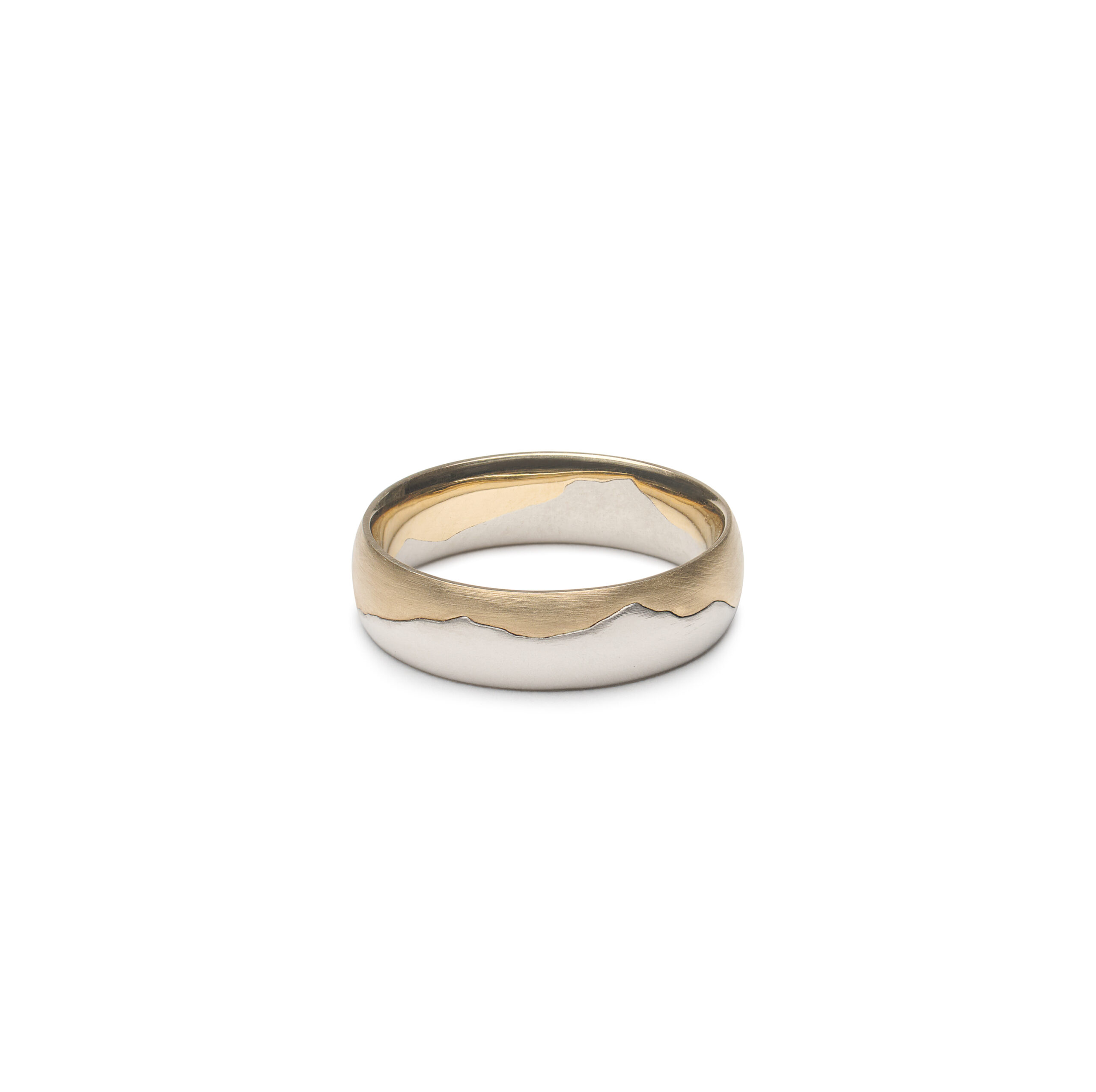 Dual metal ring depicting the green mountain in Vermont with mountains in white gold and the sky in yellow gold and a smooth finish
