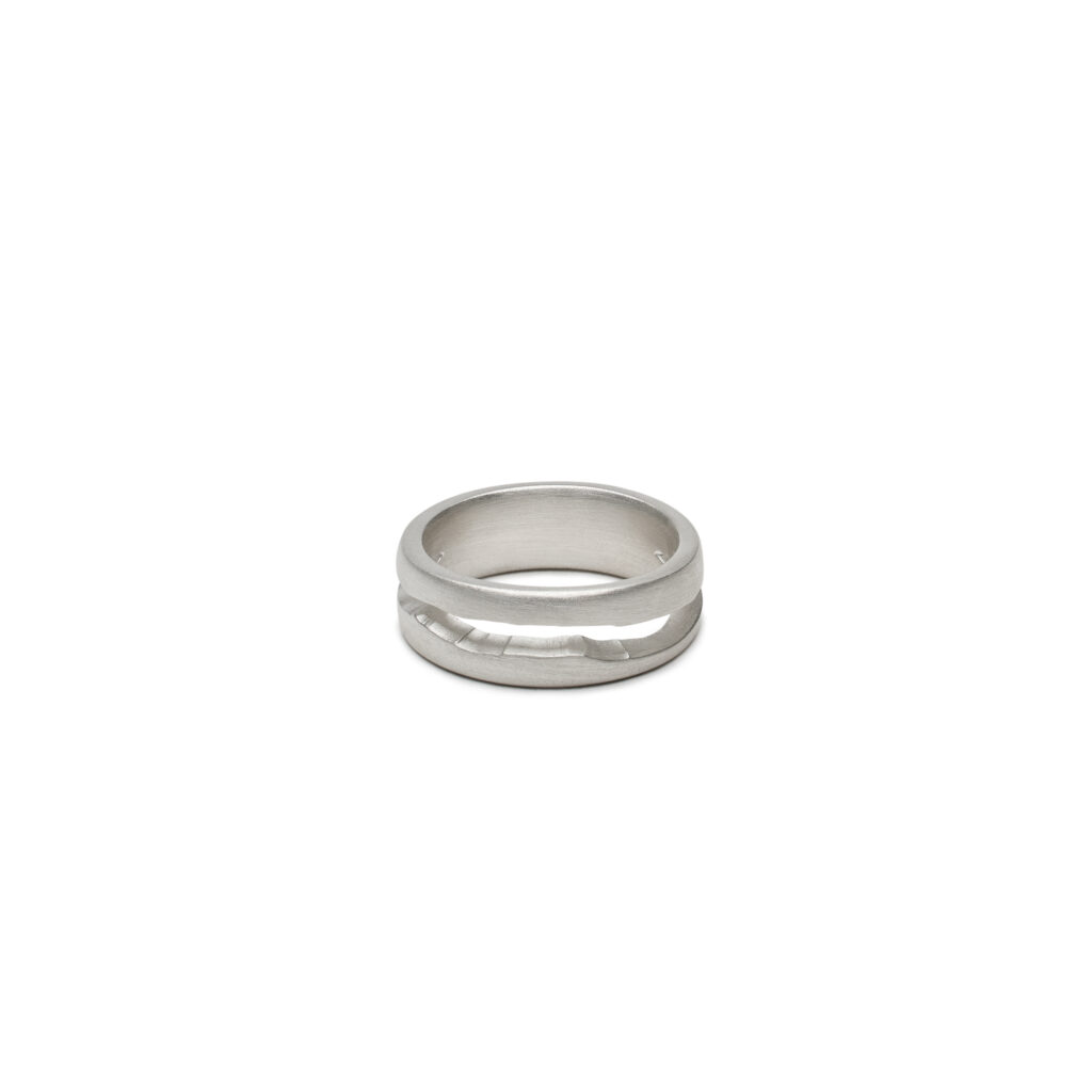 The Line of Ascent Ring captures the silhouette of Vermont’s Green Mountains, symbolizing strength, growth, and the upward journey in sterling silver or gold.