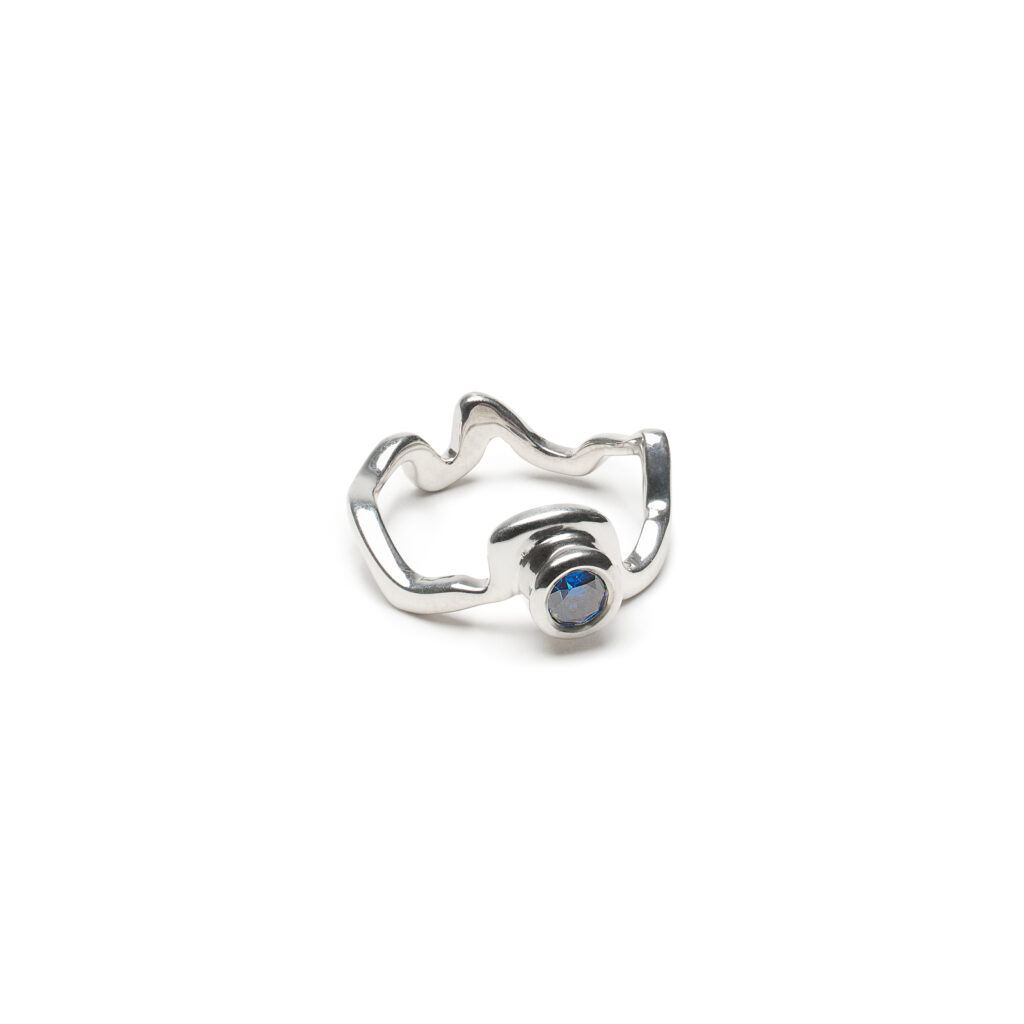 Sterling silver Winooski River Iolite Ring traces Vermont’s river from Cabot to Lake Champlain. Bezel-set iolite and shiny finish. Resizable, ready to ship.
